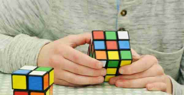 puzzle game, puzzle cube, rubiks cube being solved