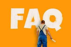Frequently Asked Questions section, man painting the word "FAQ"
