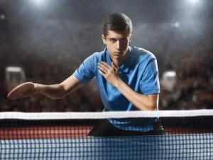 man-focusing-on-playing-table-tennis