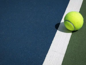 tennis-ball-on-court-line