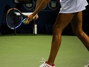 women-in-tennis-skirt-with-racket